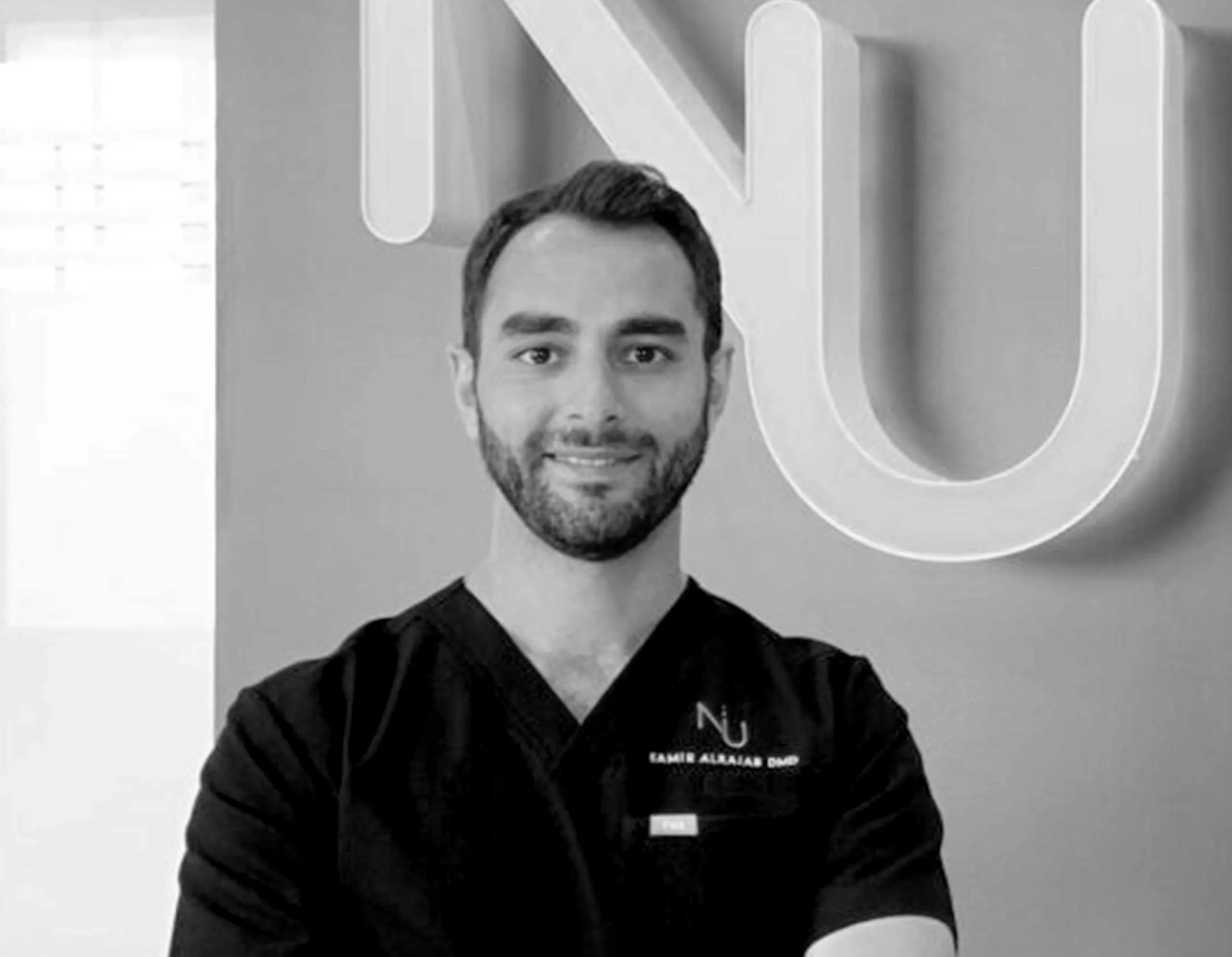 A black and white picture of Dr. Samir Aljarab.