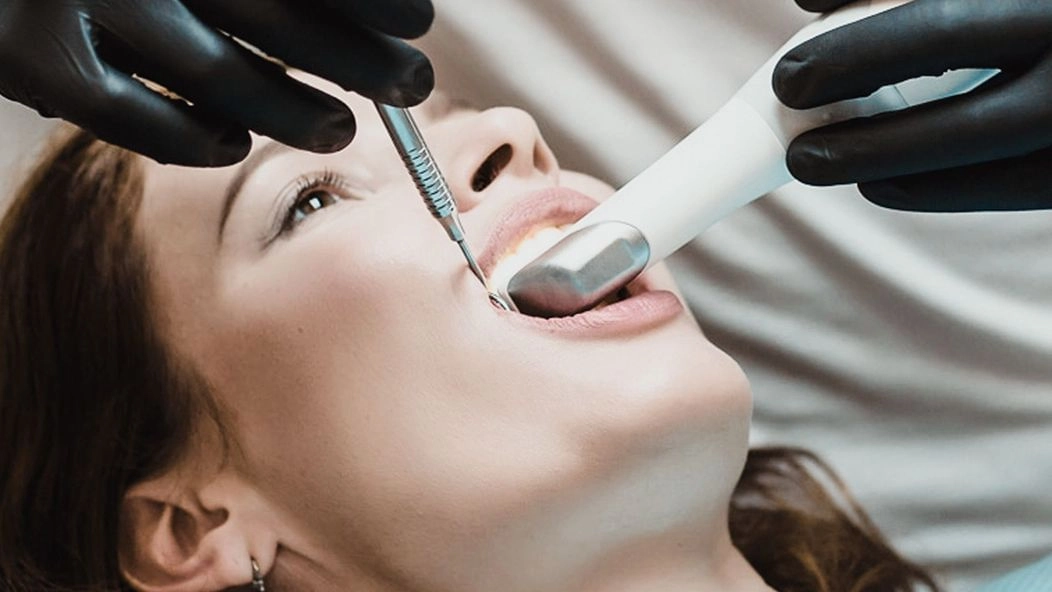 An image of a lady going through a dental procedure